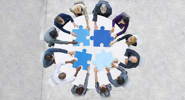 Business People and Puzzle.jpg